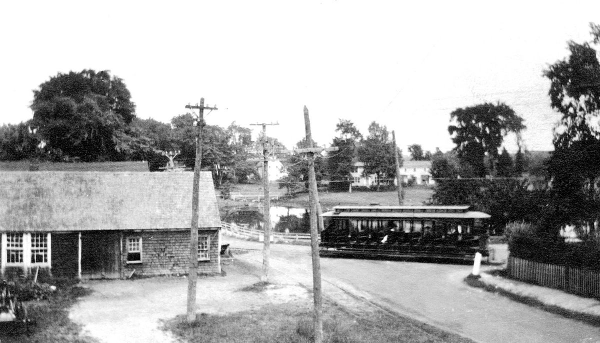 View from where the new Masonic Lodge would rise. A trolley passing in front of Benson’s blacksmith shop.