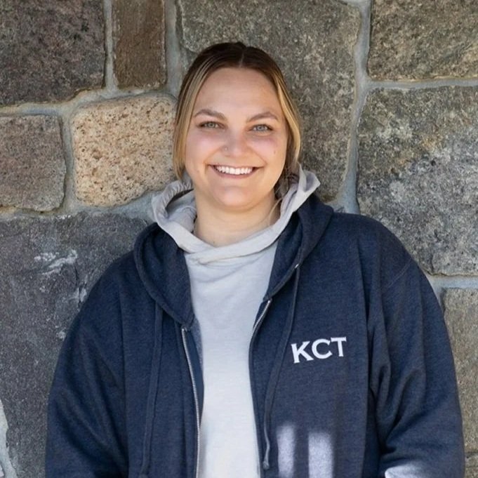 Nikki Schlie - Associate Director Nikki grew up on the east end of Long Island, NY, where the beaches, bays, and surrounding woods made the outdoors a natural part of daily life and inspired her lifelong love for nature. With a background in Business Administration and Finance, she joined the KCT as Finance Manager in 2021. As she learned more from the staff, volunteers, and community of the Trust, her passion for the organization grew and her role expanded into Associate Director. She now supports KCT’s mission through strategic planning, fundraising, and community outreach. Nikki also serves as the Administrative Coordinator for the Arundel Conservation Trust, further deepening her commitment to local conservation. When she’s not in the office, she enjoys hiking, birding, and spending time outdoors with her husband, Jeremiah, and their dog, Charli. nikki@kporttrust.org | 207.200.7456