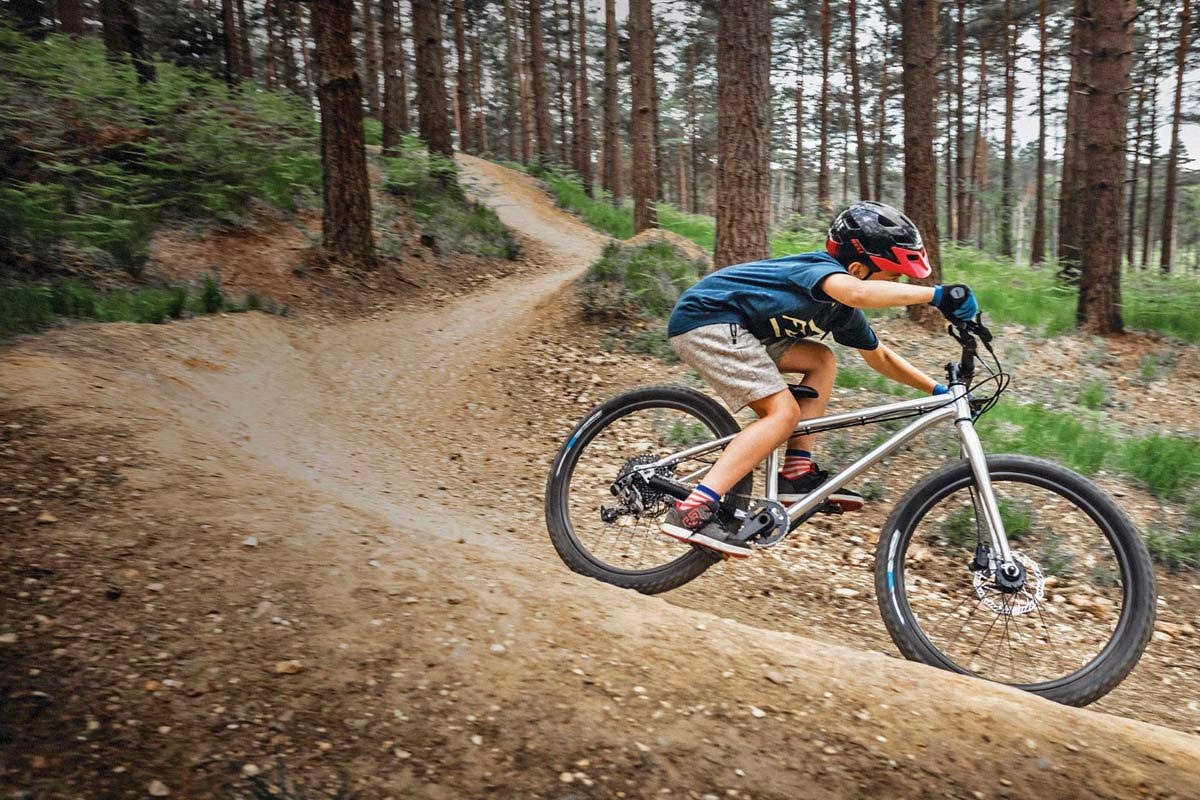 A young mountain biker enjoying ACT’s pump track