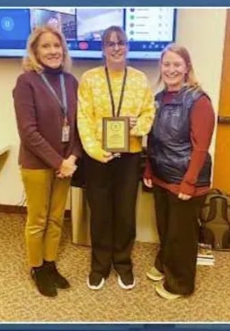 Jenna being presented with the Payson Hunter Award
